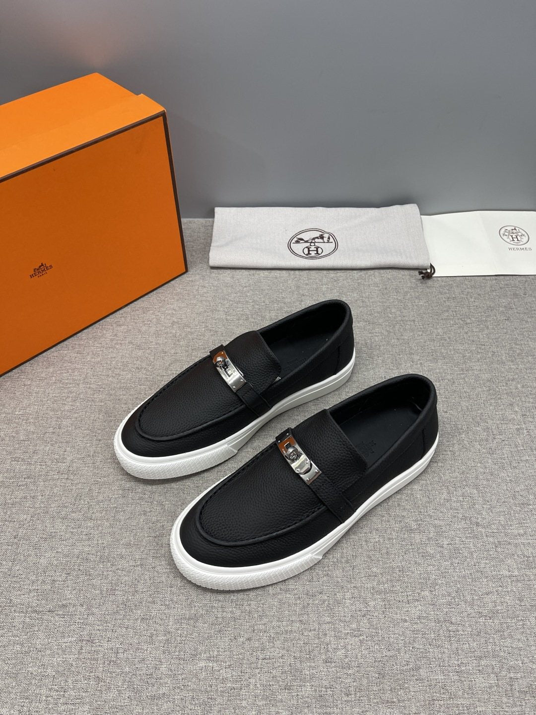 Hermès Textured Bar Loafers
